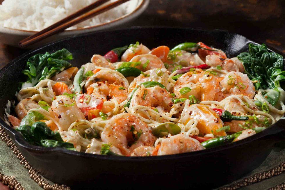 Calgary Food Photography. Garnished dish of shrimp pasta.